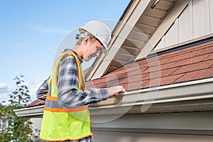 Home inspector providing an inspection to a house.