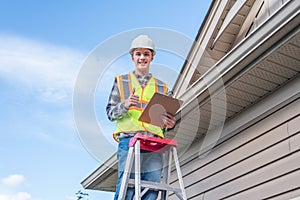 Home inspector providing an inspection to a house.