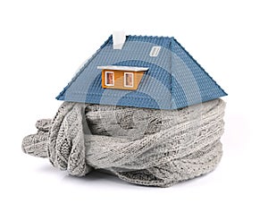 Home insulation concept. scarf around the house photo