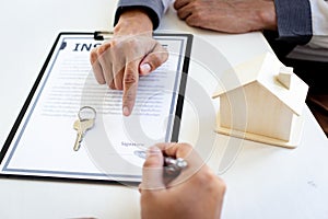 Home insurance agents offer terms and conditions to clients and get approval, home purchase and insurance contracts