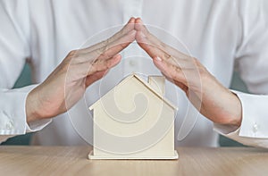 Home insurance protection and property ownership for rent, sale, leasing and safety concept with new house in landlord