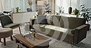 Home interior, background and living room with sofa, couch and table of furniture. Lounge design in modern house, clean