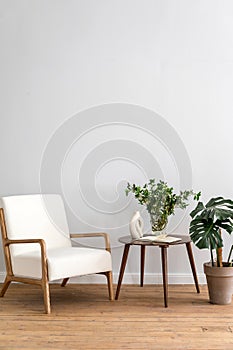 Home interior with chair and decor on side table