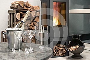 Home interior, champagne, two glasses, fireplace