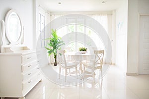 Home interior. Dinning room. Table and chairs