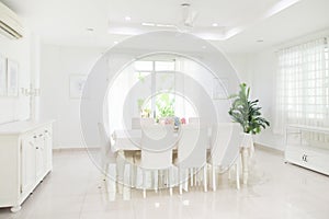 Home interior. Dinning room. Table and chairs