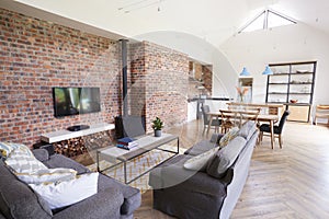 Home Interior With Open Plan Kitchen, Lounge And Dining Area