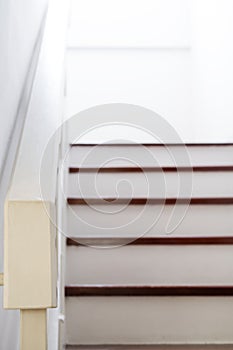 Home interior, stair to second floor, focus on handrail