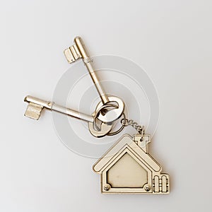 Home key on tabel. Concept for real estate busines photo