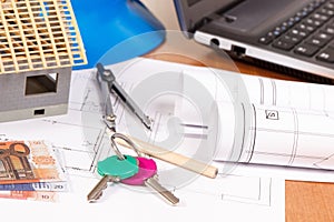 Home keys, currencies euro, electrical diagrams and accessories for engineer jobs, building home cost concept