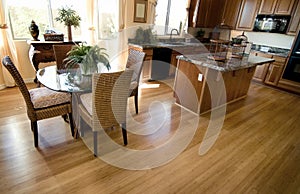 Home kitchen interior with hardwood flooring photo