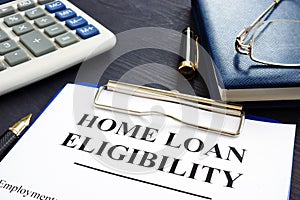 Home loan eligibility documents and glasses.