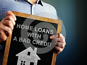 Home loans with bad credit written on a blackboard