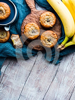 Home made banana bread muffins. Vertical