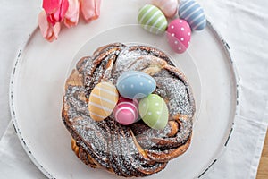 Home made chocolate easter babka with easter eggs photo