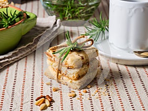 Home made cookies with rosemary and pignoli nuts