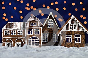 Home made gingerbread village with bokeh sky