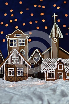 Home made gingerbread village with bokeh sky