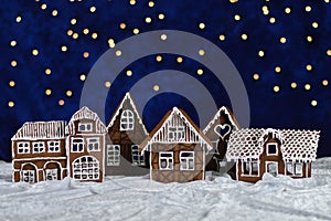 Home made gingerbread village with bokeh sky