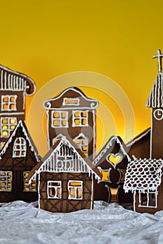 Home made gingerbread village with green background