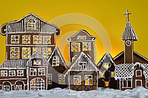 Home made gingerbread village with green background