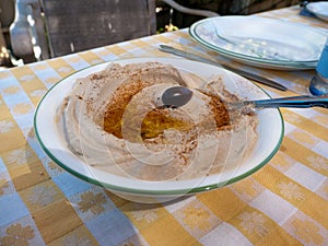 Home made humus with black olive