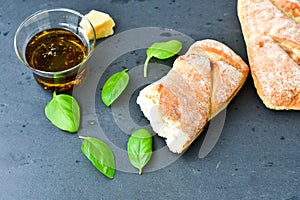 Home made italian ciabatta bread, olive oil and parmesan cheese