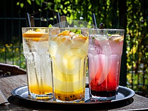 Home made lemonade in glasses on garden table