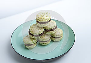 Home-made pistachio macaroons on plate