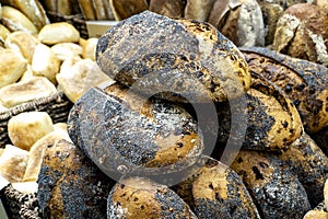 Home-made poppy seed covered breads in market
