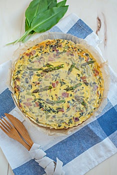 Home made quiche with green asparagus