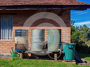 A home made rain water collector system made from steel barrels