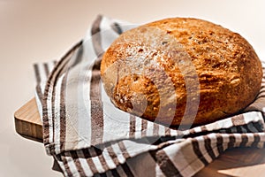 Home made rustic crusty traditional round bread freshly from the oven