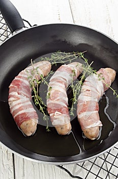 Home made sausage wrapped with bacon