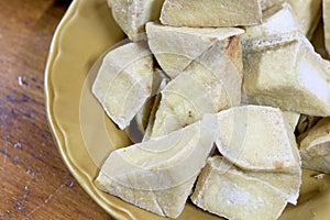 Home made of snack and dessert, Chinese Traditional Deep Fried Tofu or Fried Bean Curd Served in dish on wooden table