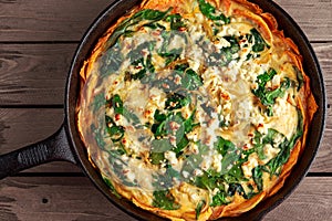Home made Spinach quiche in a sweet potato crust with feta cheese photo