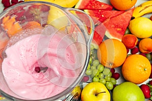 Home-made strawberry smoothie with an assortment of fruits