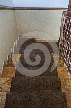 home marble staircase with railing.first person view. Stairs leading down to down floor. Interior design