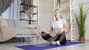 Home meditating spiritual practice relaxed woman