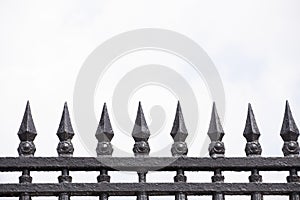 Home metal fence old vintage style with sharp spikes