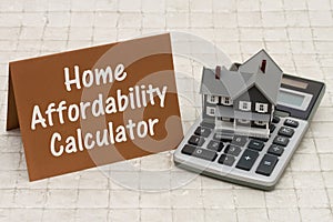 Home Mortgage Affordability Calculator, A gray house, brown card