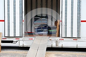 Home moving truck and stacking furniture pads