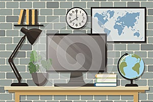 Home office concept, workspace. Computer monitor, table lamp, indoor plants on the table, world map and wall posters.