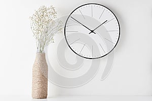 Home office minimal workspace desk with wall clock