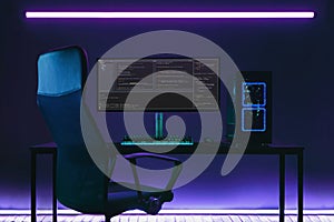 Home office programmer workplace with professional coding setup on desktop