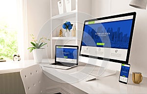 home office setup with responsive design on screen