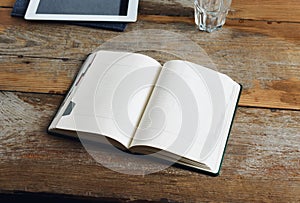 Home office table open notepad blank pages