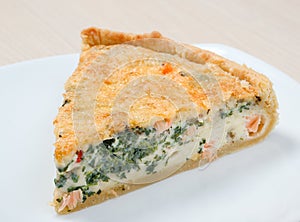 Home pie with verdure and salmon