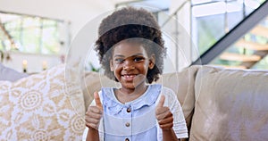 Home, portrait and black girl with thumbs up, smile and relax with support, agreement and feedback. African person