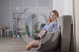 Home portrait of pregnant Happy Woman. Mom Expecting Baby. Pregnant Woman Belly
